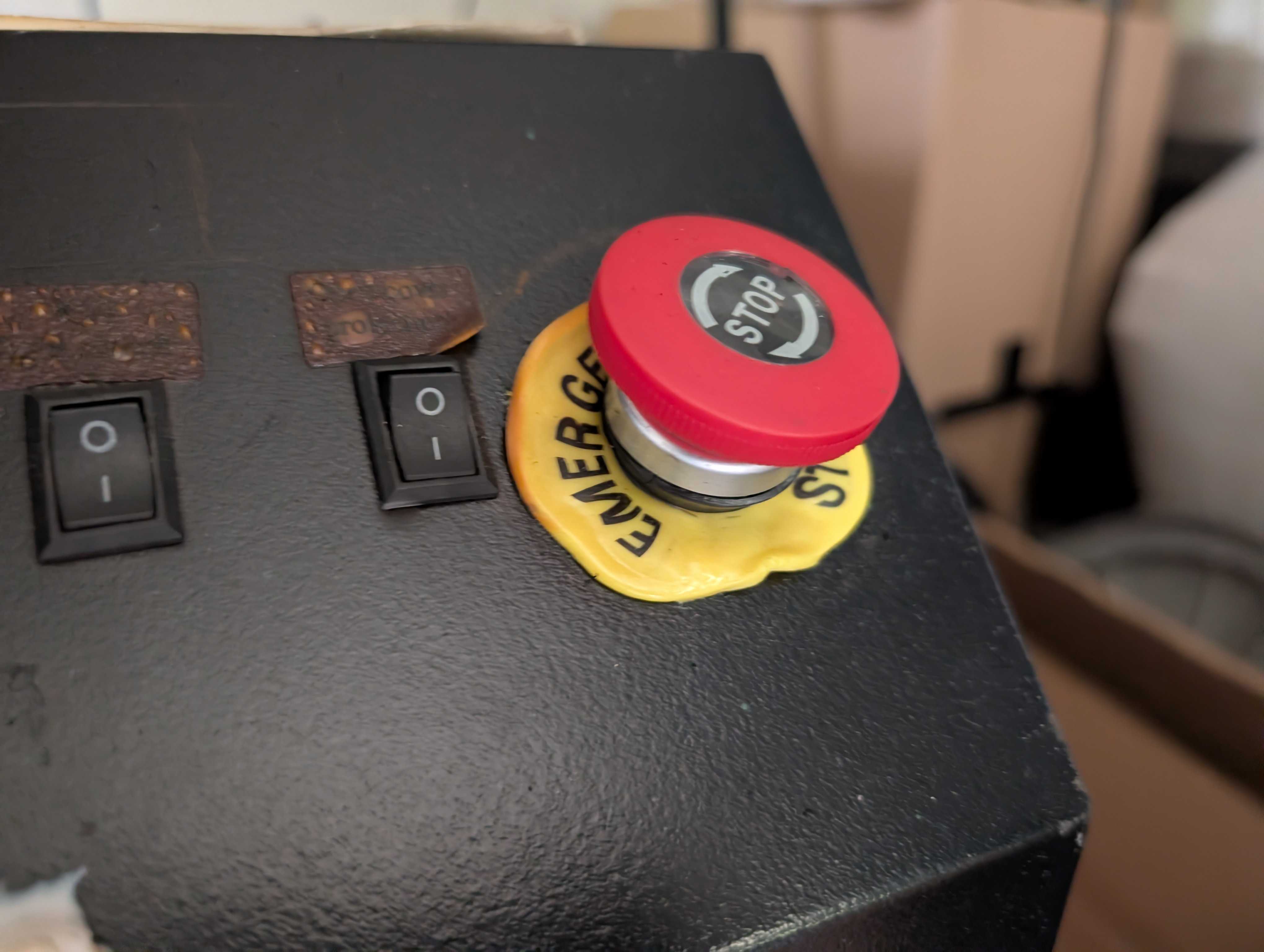 Photo of a melted e-stop button